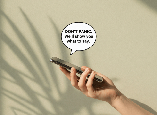 a hand gently holding a smartphone against a soft, beige or light green background